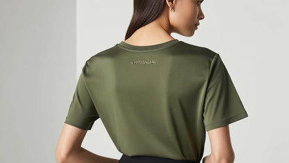 Back view of Green Olive bamboo tee for women – tailored fit with clean lines and smooth drape, made from sustainable bamboo fiber.

